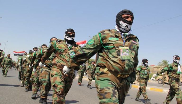 مليشيات موالية لإيران خلال استعراض عسكري داخل العراق