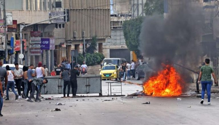 اشتباكات بين الأمن الفلسطيني ومحتجين في نابلس