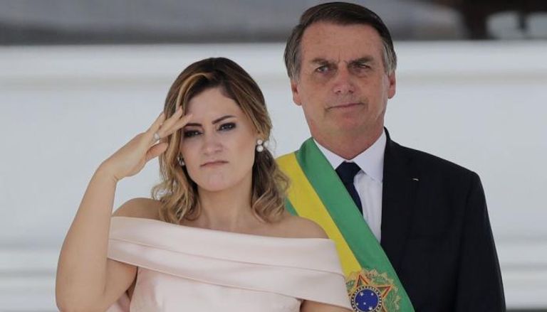 الرئيس البرازيلي السابق جايير بولسونارو برفقة زوجته - أرشيفية