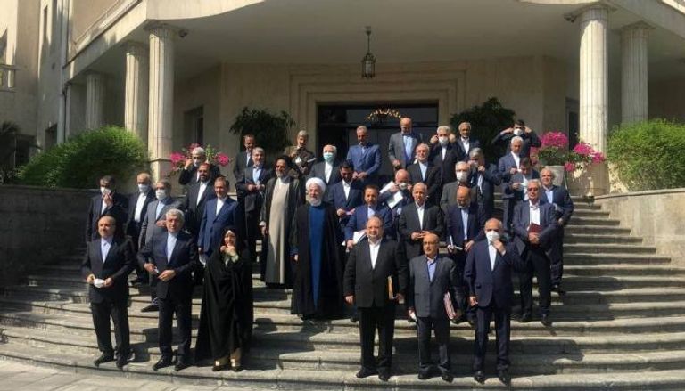 حسن روحاني مع أعضاء حكومته - أرشيفية