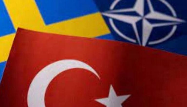 علما تركيا والسويد وشعار الناتو