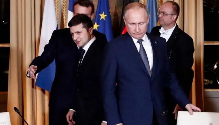 بوتين وزيلنسكي في لقاء سابق