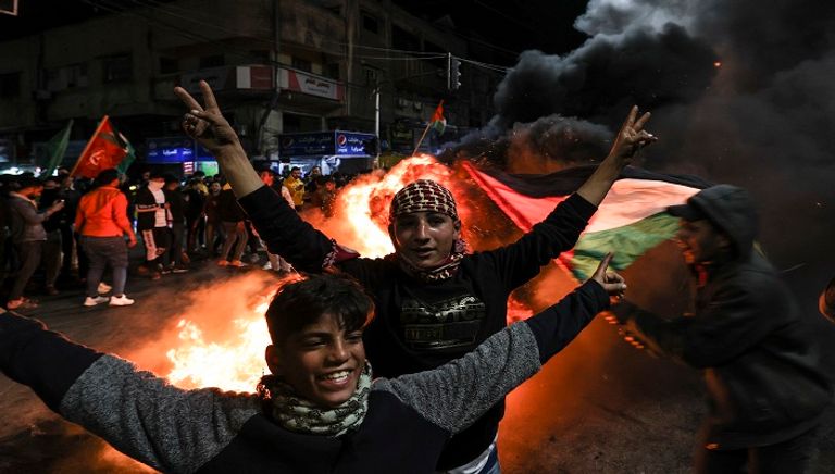 احتفالات في فلسطين بعد هجوم القدس  - فرانس برس