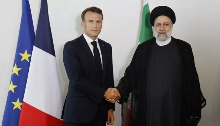 جانب من لقاء سابق بين الرئيس الفرنسي ماكرون ونظيره الإيراني رئيسي