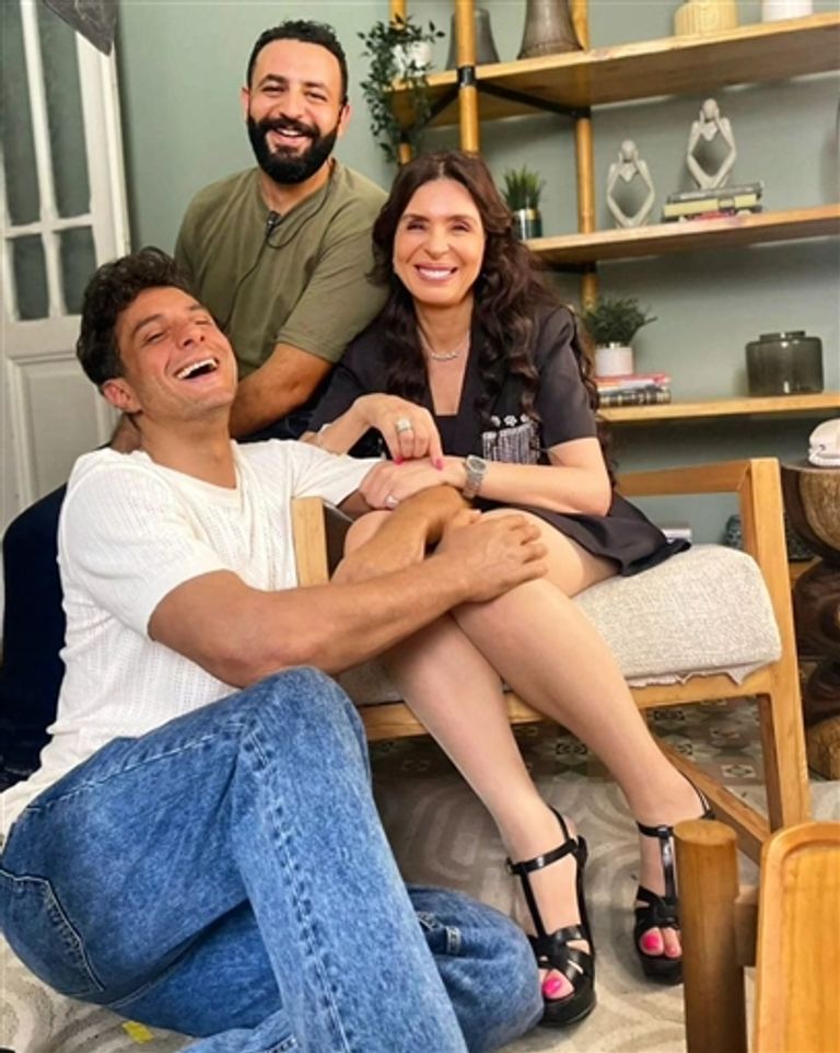 أحمد الفيشاوي ودينا 