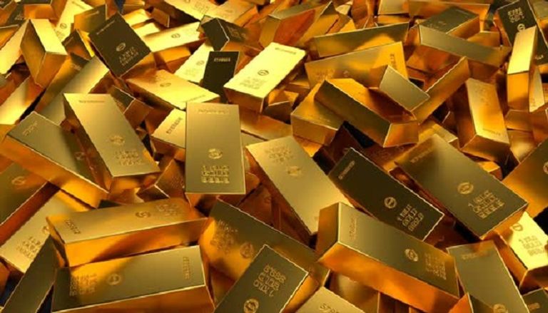 سبائك ذهبية ودولارات