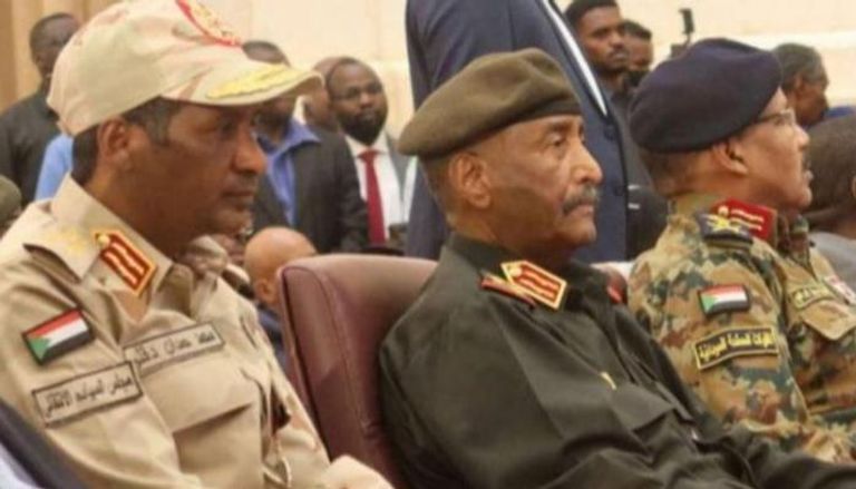 مواطنون سودانيون يفرون من أعمال القتال بدارفور - رويترز