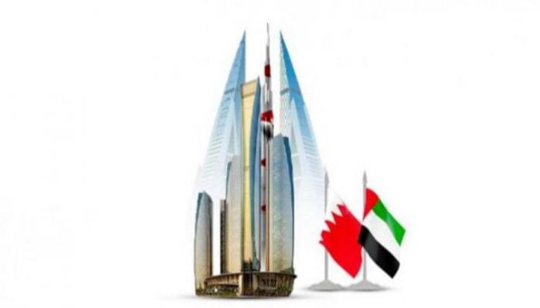 أعلام  الإمارات والبحرين