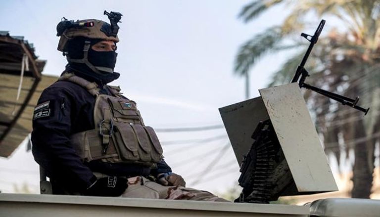 أحد عناصر الشرطة العراقية - أ ف ب 