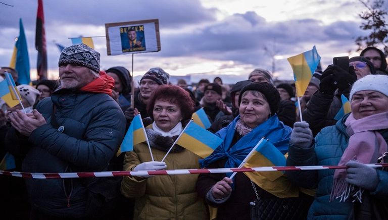 جانب من الاحتجاجات التي تطالب بإرساء سلام في أوكرانيا - أ ف ب