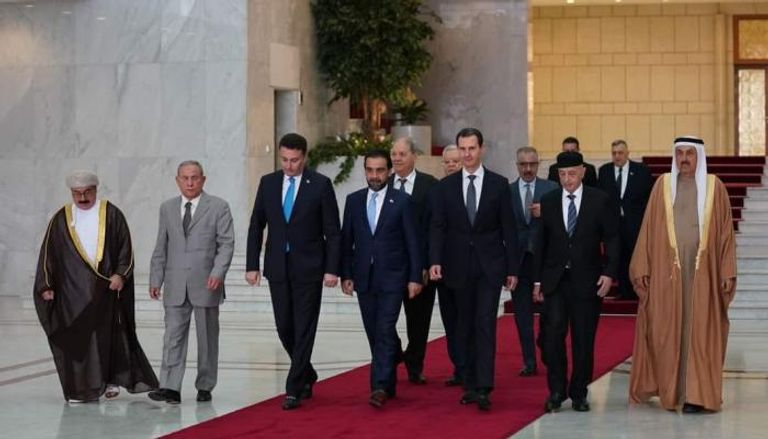 عقيلة صالح بجوار الرئيس السوري خلال صورة لرؤساء البرلمانات العربية