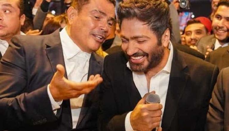 عمرو دياب وتامر حسني خلال حفل زفاف أحمد عصام