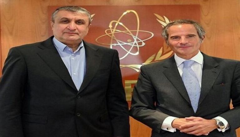 مدير وكالة الطاقة الذرية غروسي خلال لقاء رئيس منظمة الطاقة الإيرانية محمد إسلامي