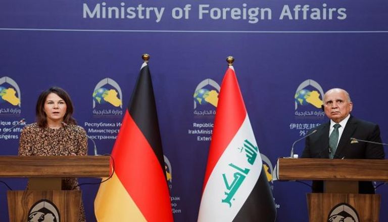 وزيرة خارجية ألمانيا بربوك في مؤتمر مع نظيرها العراقي فؤاد حسين 