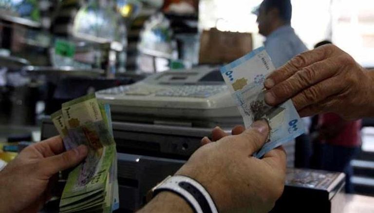 تعاملات الدولار الأمريكي في سوريا - أرشيفية