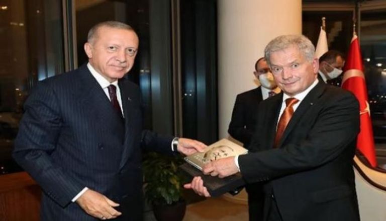 جانب من لقاء سابق بين الرئيسين التركي أردوغان والفنلندي نينيستو