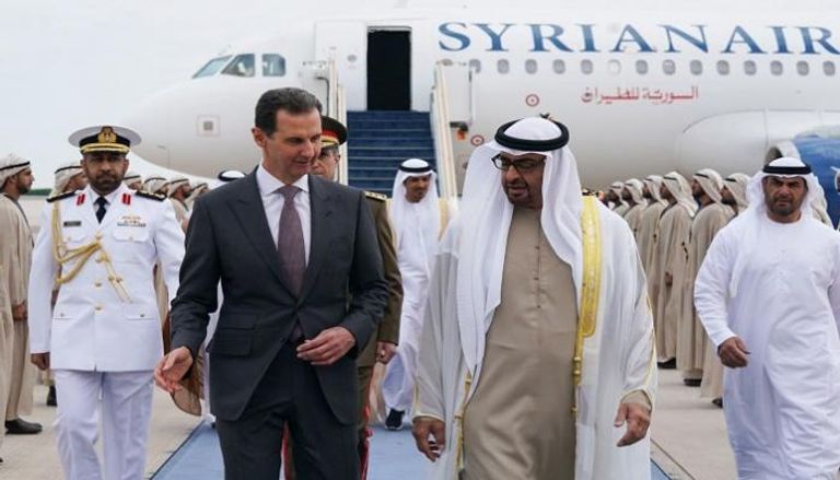 جانب من استقبال الشيخ محمد بن زايد آل نهيان للرئيس السوري بشار الأسد