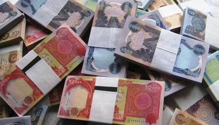 عملات نقدية عراقية من فئات مختلفة