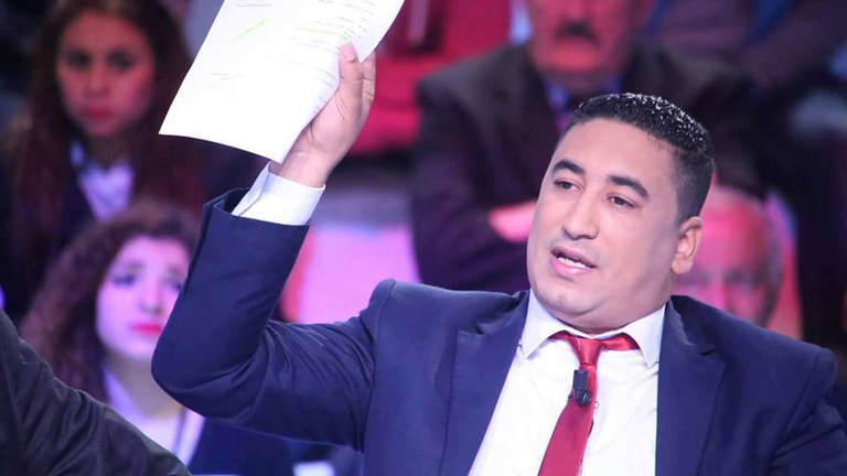 النقابي الأمني التونسي عصام الدردوري - أرشيفية راشد الغنوشي خلال تجمع لإخوان تونس - أرشيفية