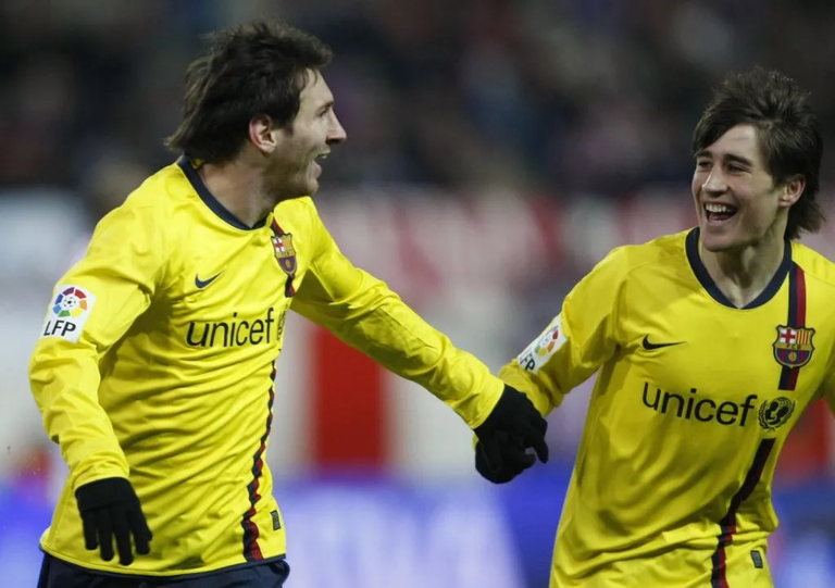 ليونيل ميسي وبويان لامين يامال لاعب برشلونة