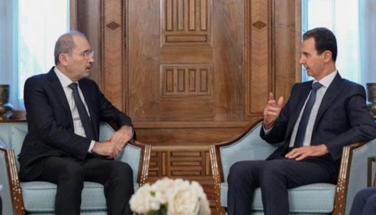 الرئيس السوري بشار الأسد مع وزير الخارجية الأردني في لقاء سابق