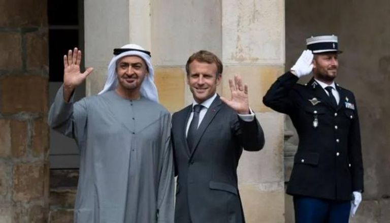 الشيخ محمد بن زايد آل نهيان مع الرئيس الفرنسي ماكرون