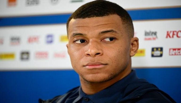 كريم بنزيما وإيرلينغ هالاند