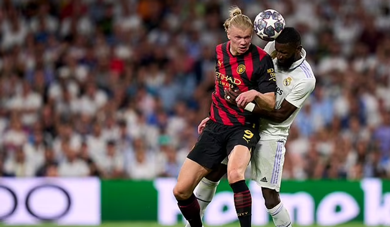 إيرلينغ هالاند وأنطونيو روديغير إيرلينغ هالاند وبيب غوارديولا