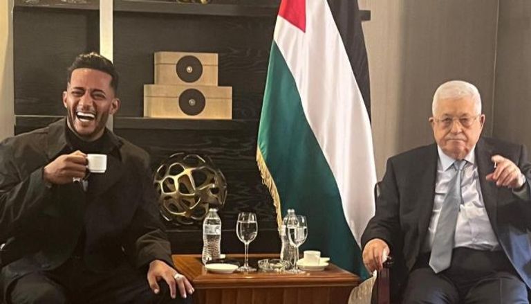 الرئيس الفلسطيني محمود عباس أبومازن ومحمد رمضان