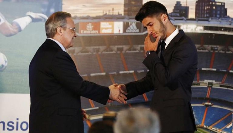 ماركو أسينسيو وفلورنتينو بيريز رئيس ريال مدريد