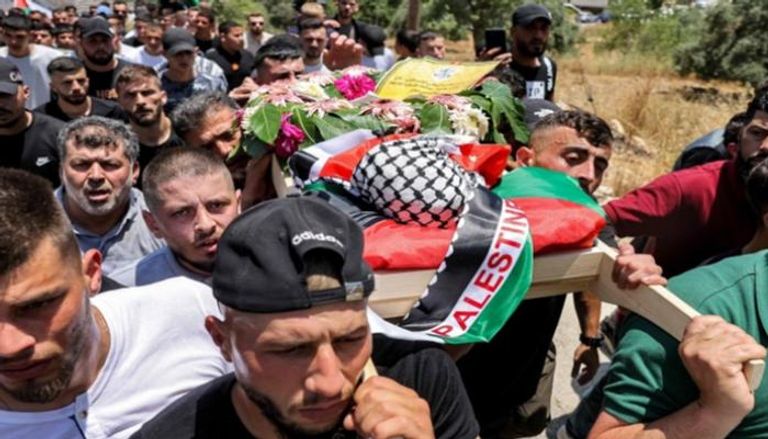 جانب من تشييع جثمان الطفل الفلسطيني
