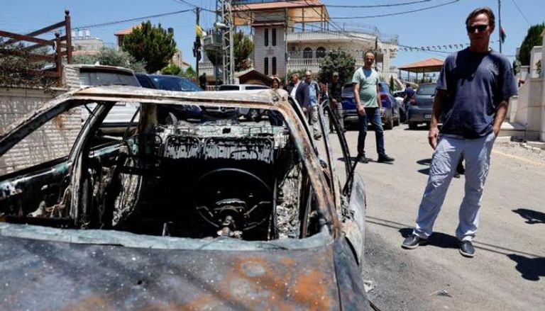 سيارات فلسطينية محترقة جراء هجمات المستوطنين على الضفة الغربية - أرشيفية