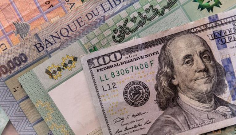 100ألف ليرة لبنانية و دولار أمريكي - أرشيفية 