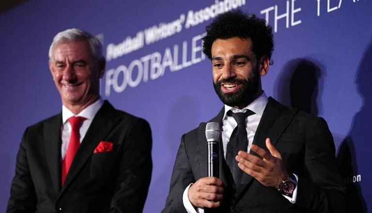 محمد صلاح وإيان راش