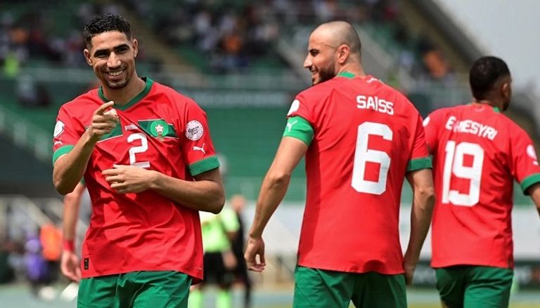 منتخب المغرب في كأس أمم أفريقيا وليد الركراكي مدرب المغرب مع قائد الكونغو الديمقراطية