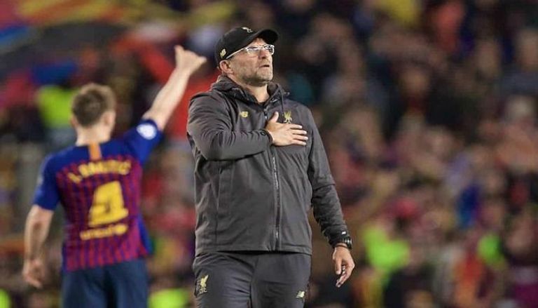 يورغن كلوب تشافي هيرنانديز مدرب برشلونة