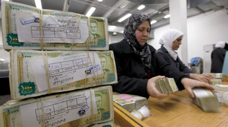 الليرة السورية مقابل الدولار الأمريكي 