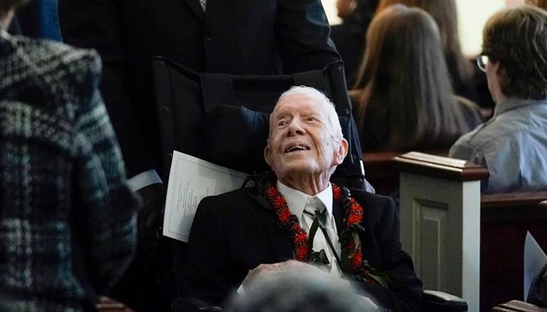 دونالد ترامب وباراك أوباما وزوجتيهما