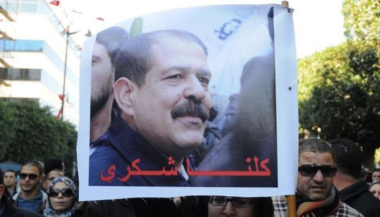 صورة لشكري بلعيد في احتجاجات أعقبت اغتياله