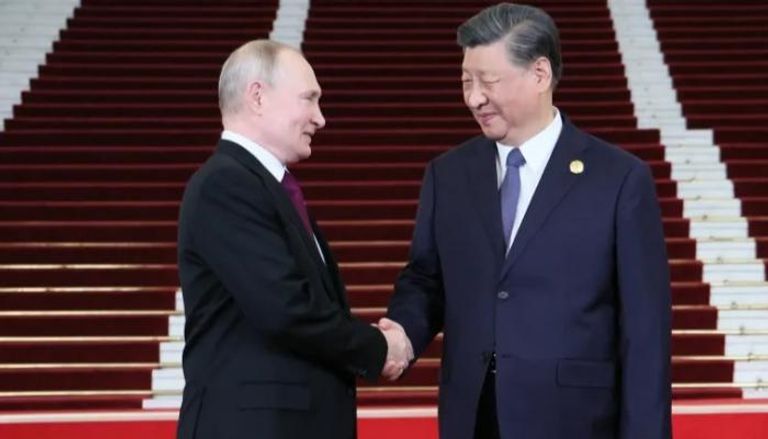 بوتين وشي في لقاء سابق