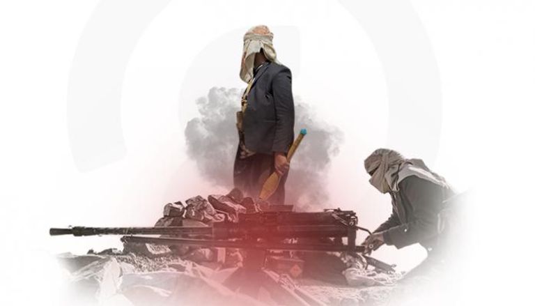 مسلحون حوثيون يرفعون صور زعيم المليشيات - أرشيفية