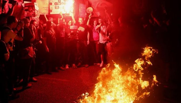 مظاهرة معارضة لنتنياهو في تل أبيب - رويترز