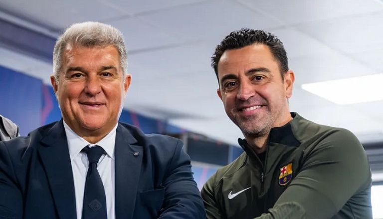 تشافي ولابورتا ريال مدريد بطل الدوري الإسباني