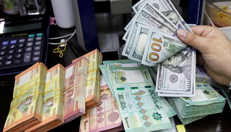 الليرة اللبنانية والدولار الأمريكي - أرشيفية