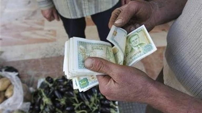 بعض فئات العملة السورية - أرشيفية