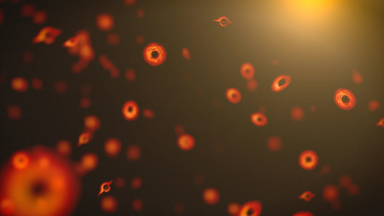 رسم توضيحي لمجموعة من الثقوب السوداء البدائية. لغز جديد يمر عبر الثقوب السوداء