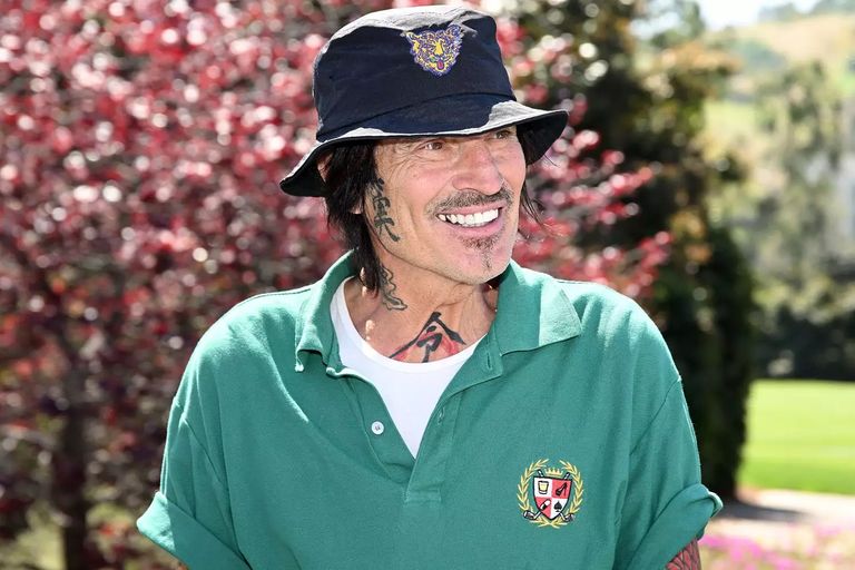 تومي لي عضو فرقة موتلي كرو