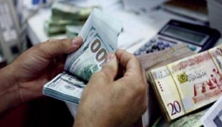  الدولار مقابل الدينار الليبي 