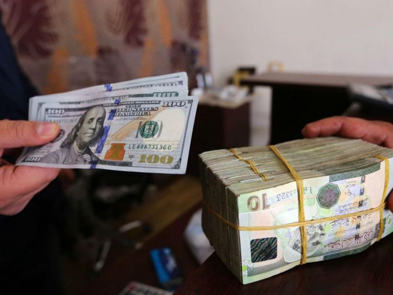 الدولار الأمريكي والدينار الليبي