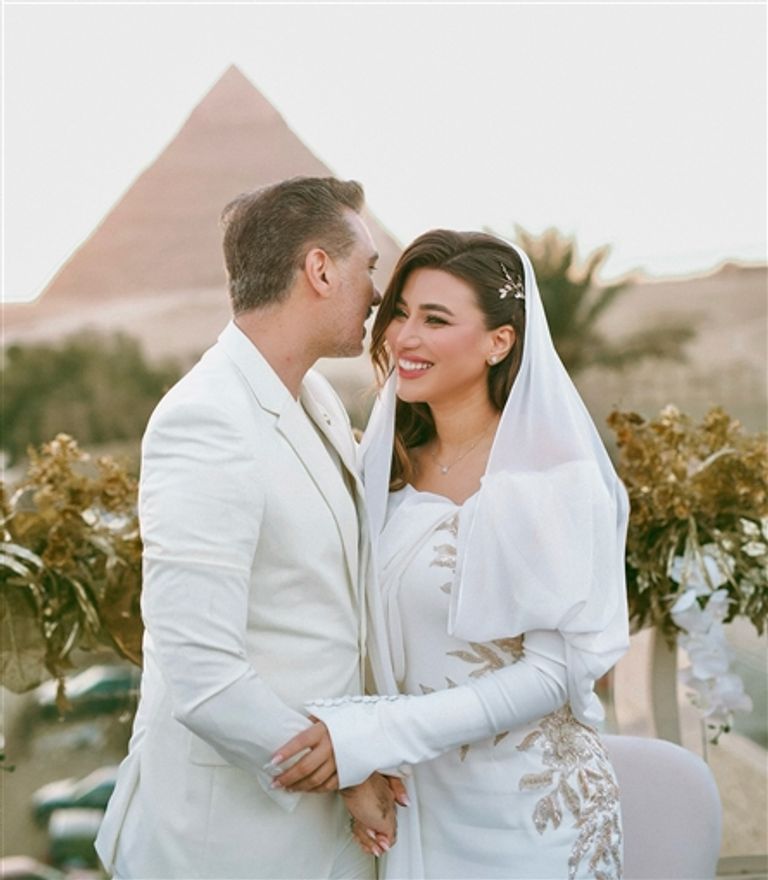 هايدي موسى وزوجها محمد غانم